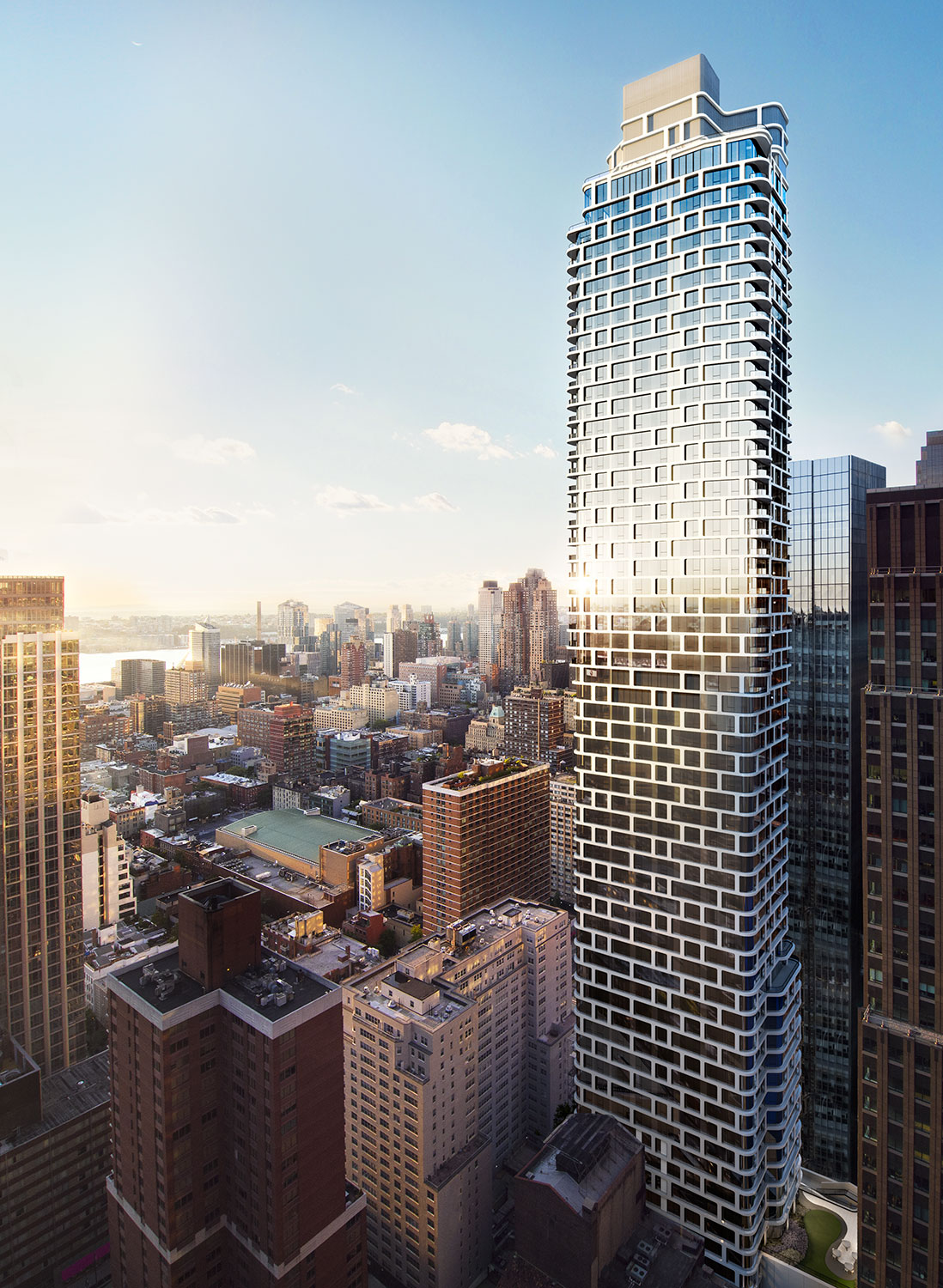 ARO’s curved glass tower enhances its surroundings with a distinctive white metal grid.